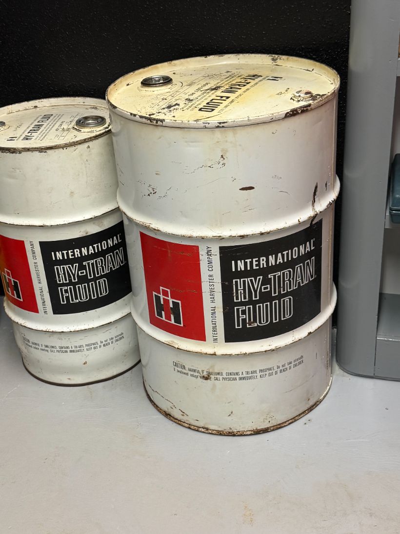 Two vintage International Hy-Tran Fluid drums